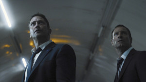 Gerard Butler and Aaron Eckhart take a moment to figure out why they agreed to make this movie. (Photo: Focus Features)