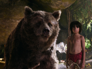 Mowgli (Neel Sethi) with Baloo (voiced by Bill Murray) in Disney's Jungle Book